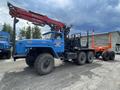 Лесовозный автопоезд Урал с манипулятором и прицепом роспуском